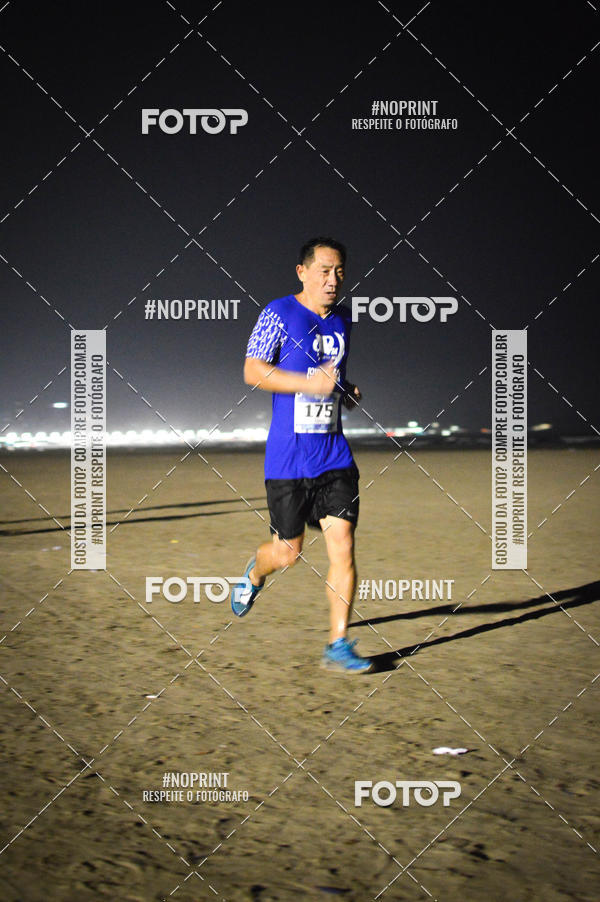 Buy your photos of the eventJovem Pan Night Run Santos on Fotop