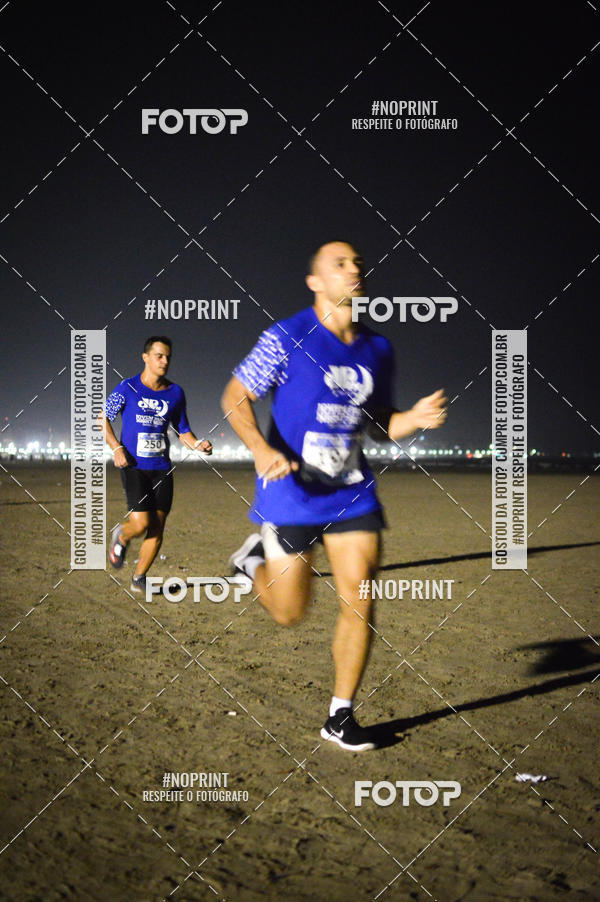 Buy your photos of the eventJovem Pan Night Run Santos on Fotop
