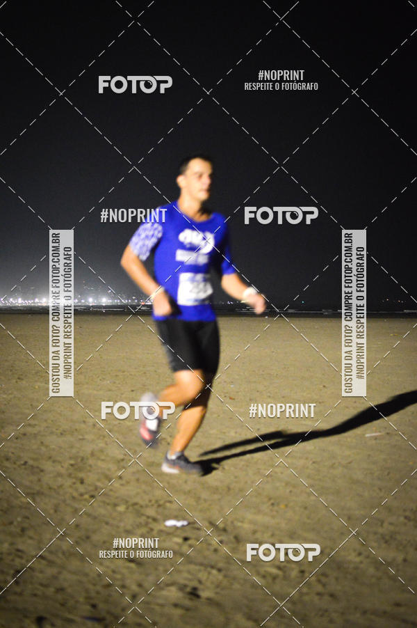 Buy your photos of the eventJovem Pan Night Run Santos on Fotop