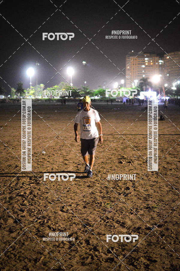 Buy your photos of the eventJovem Pan Night Run Santos on Fotop