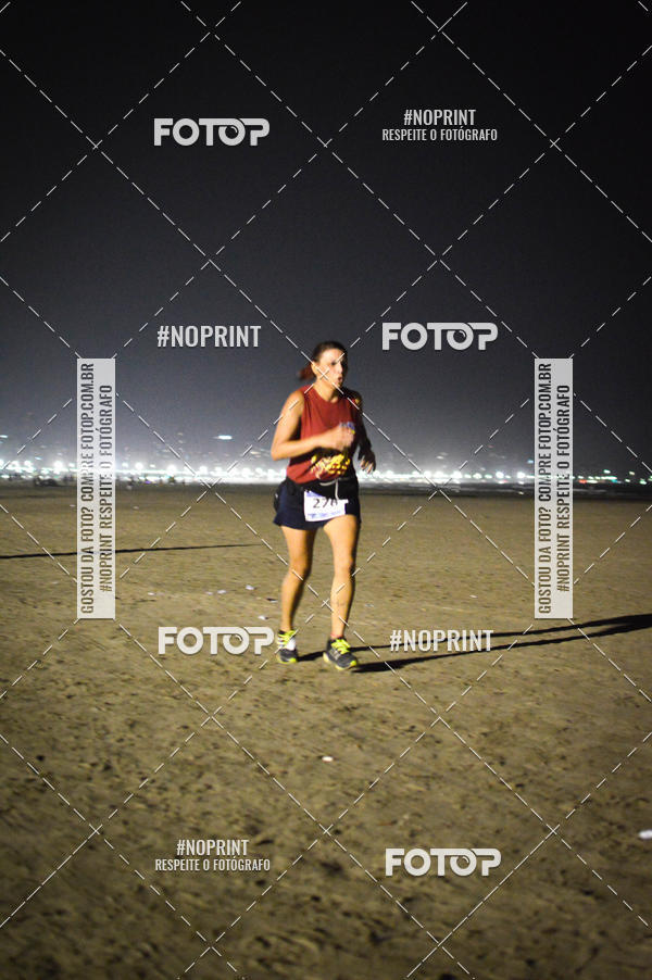 Buy your photos of the eventJovem Pan Night Run Santos on Fotop