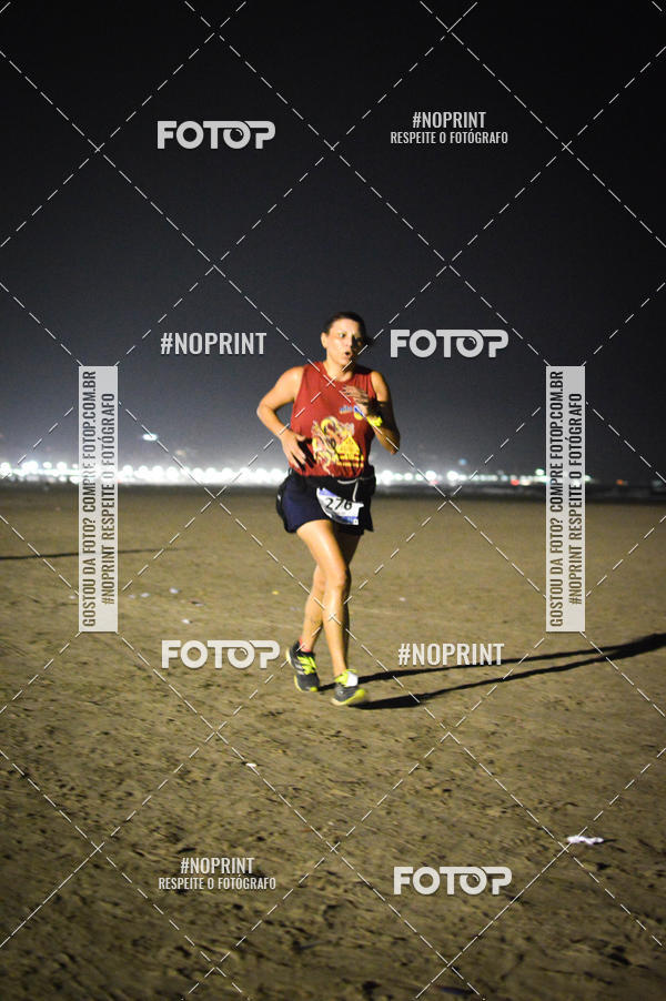 Buy your photos of the eventJovem Pan Night Run Santos on Fotop
