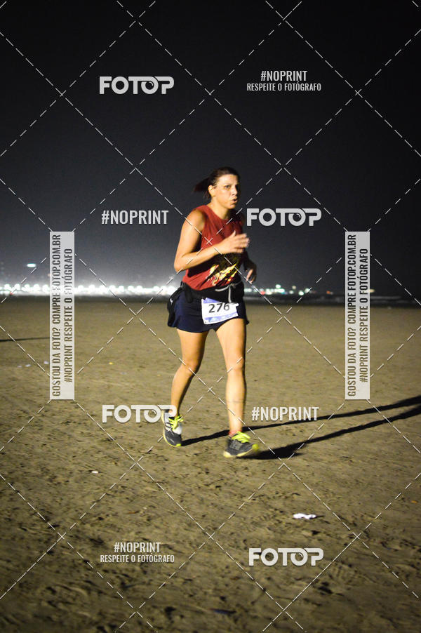 Buy your photos of the eventJovem Pan Night Run Santos on Fotop
