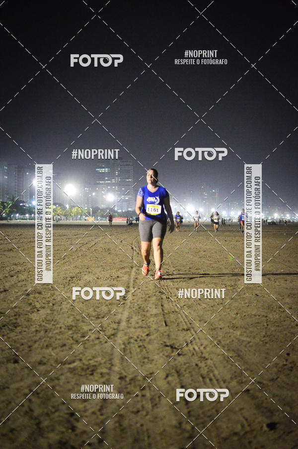 Buy your photos of the eventJovem Pan Night Run Santos on Fotop
