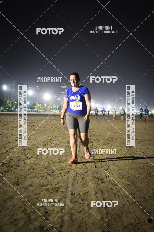 Buy your photos of the eventJovem Pan Night Run Santos on Fotop