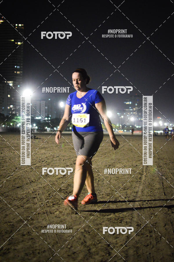 Buy your photos of the eventJovem Pan Night Run Santos on Fotop