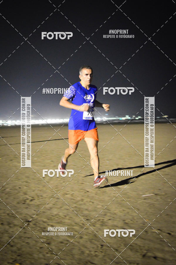 Buy your photos of the eventJovem Pan Night Run Santos on Fotop