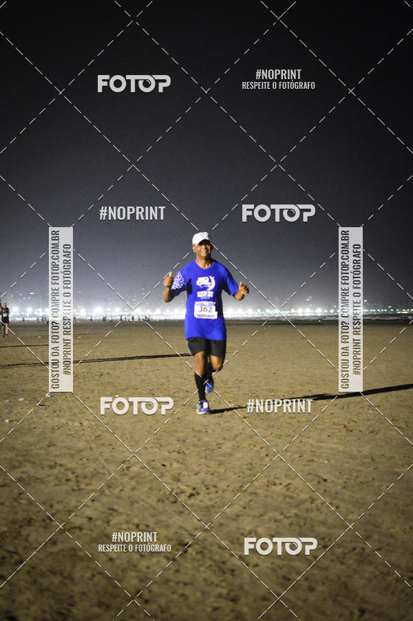 Buy your photos of the eventJovem Pan Night Run Santos on Fotop