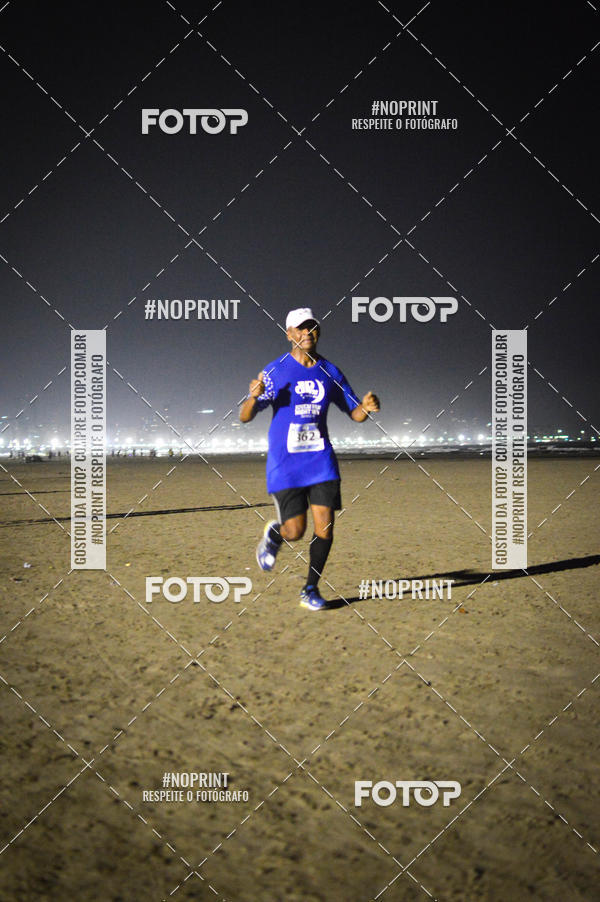 Buy your photos of the eventJovem Pan Night Run Santos on Fotop