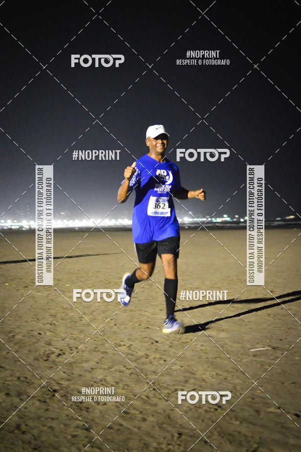 Buy your photos of the eventJovem Pan Night Run Santos on Fotop