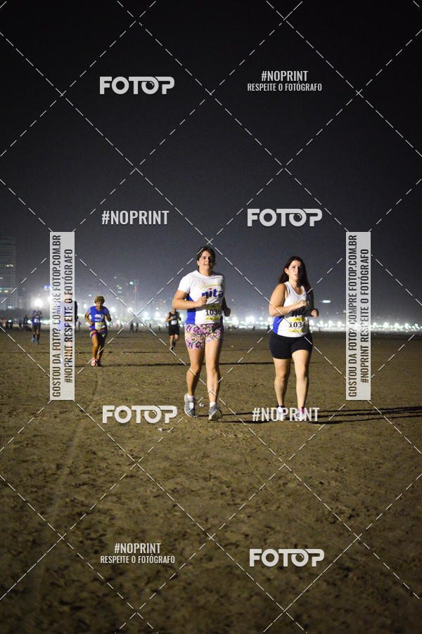 Buy your photos of the eventJovem Pan Night Run Santos on Fotop