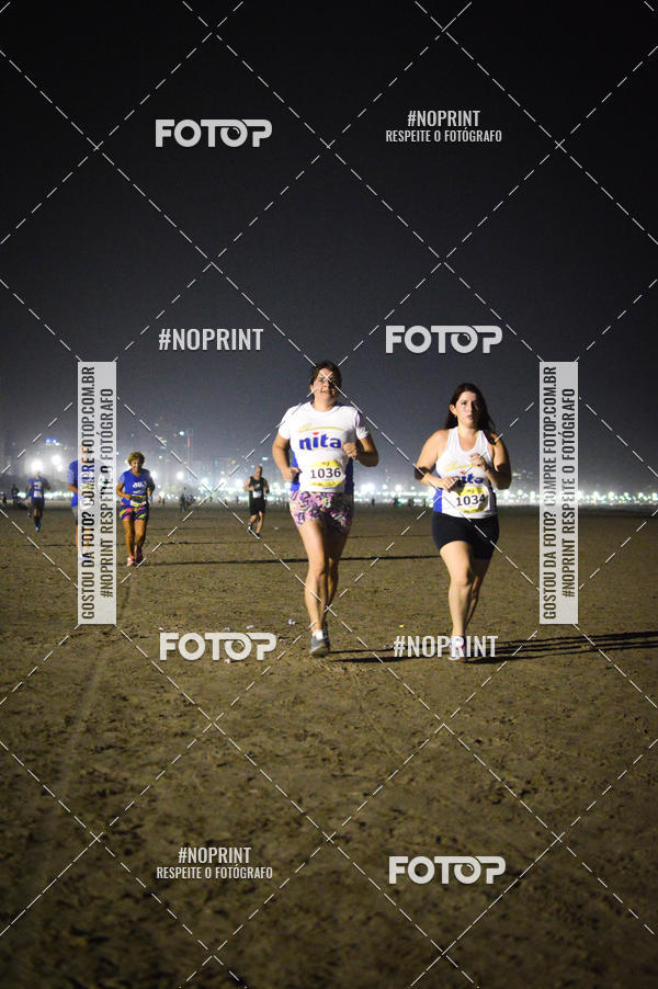 Buy your photos of the eventJovem Pan Night Run Santos on Fotop