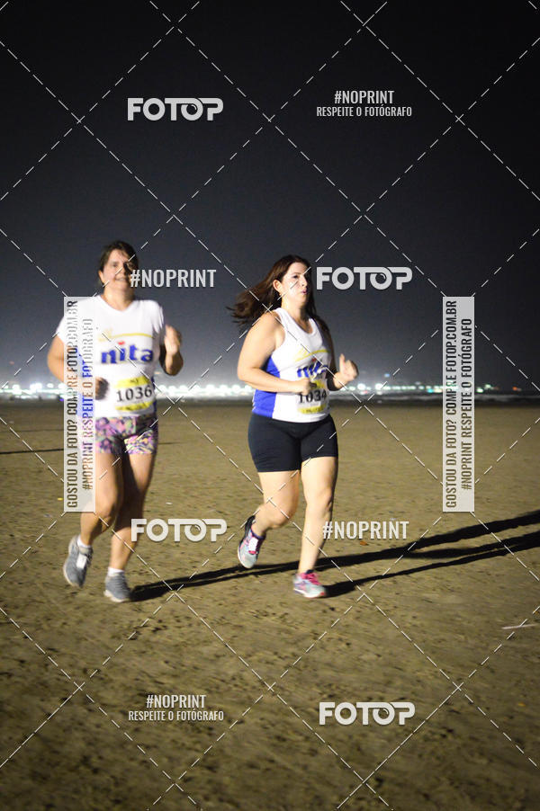 Buy your photos of the eventJovem Pan Night Run Santos on Fotop