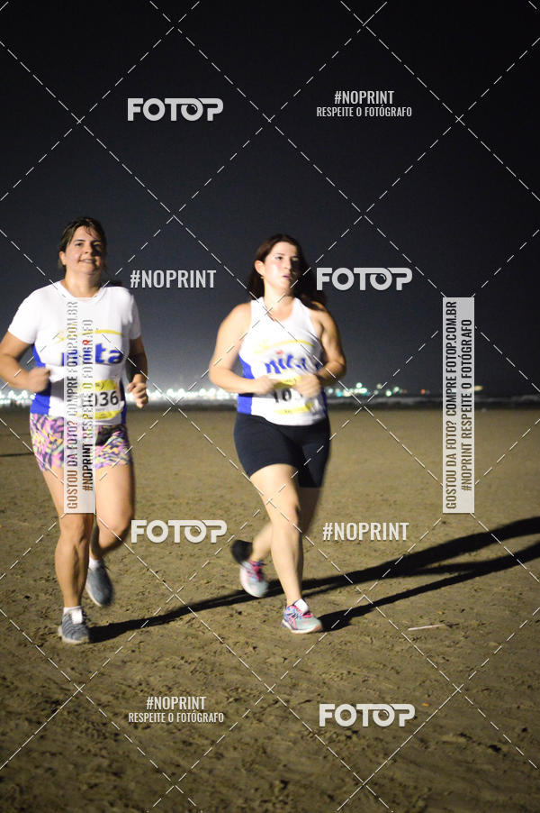 Buy your photos of the eventJovem Pan Night Run Santos on Fotop
