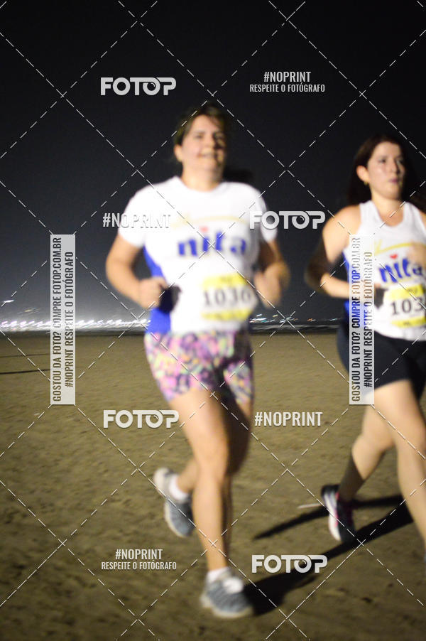 Buy your photos of the eventJovem Pan Night Run Santos on Fotop