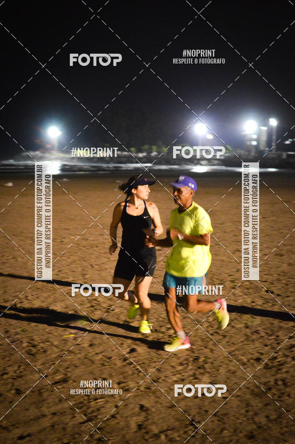 Buy your photos of the eventJovem Pan Night Run Santos on Fotop
