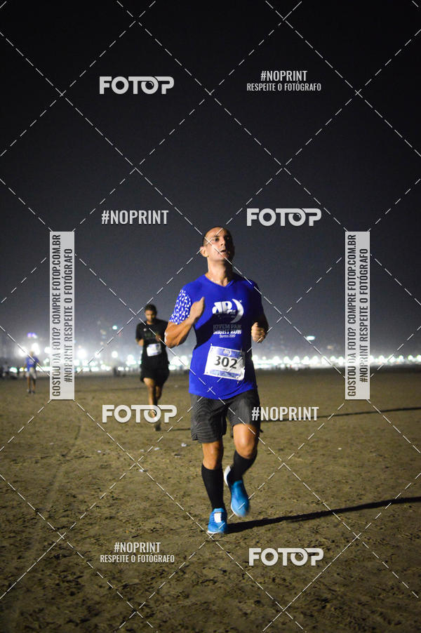 Buy your photos of the eventJovem Pan Night Run Santos on Fotop