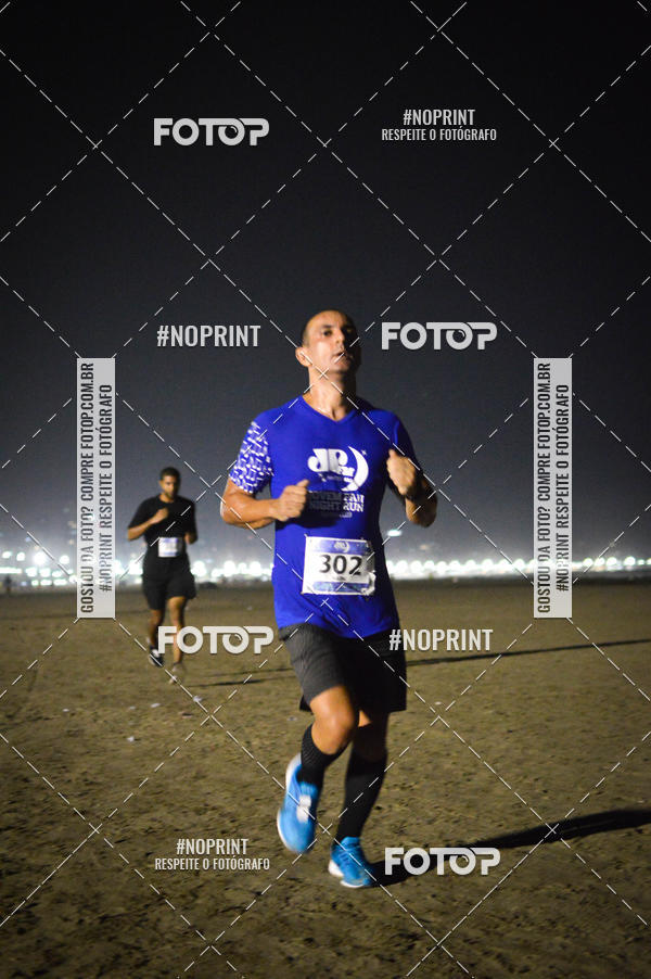Buy your photos of the eventJovem Pan Night Run Santos on Fotop