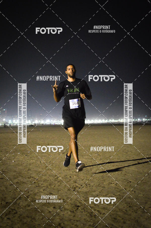 Buy your photos of the eventJovem Pan Night Run Santos on Fotop