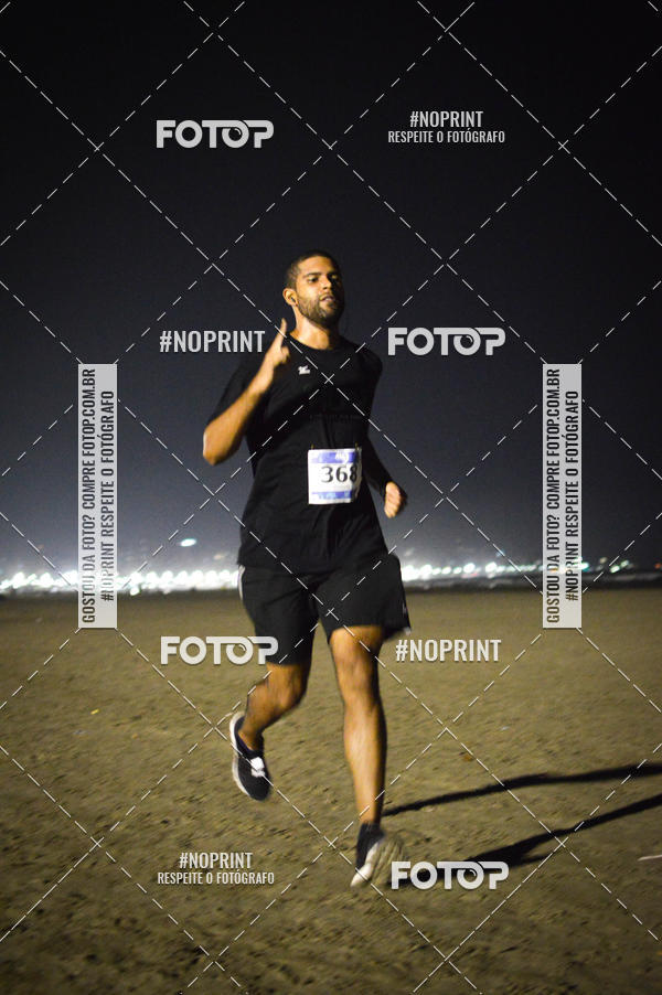 Buy your photos of the eventJovem Pan Night Run Santos on Fotop
