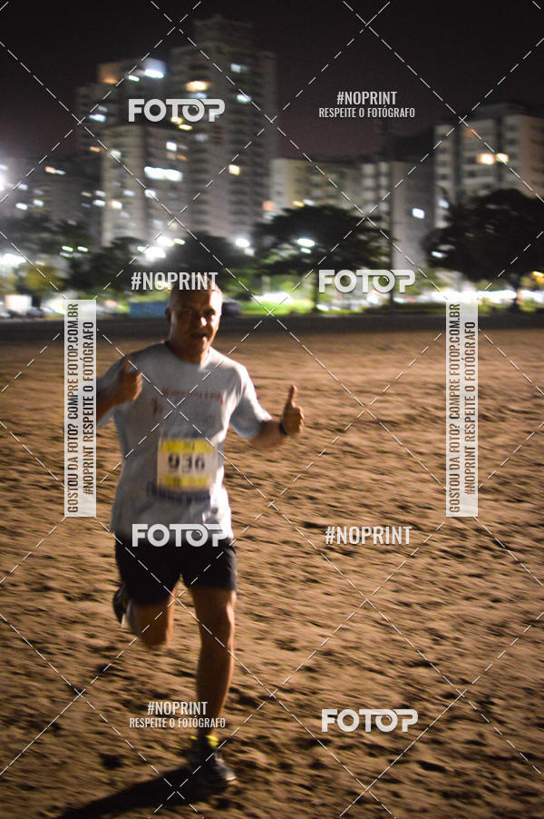Buy your photos of the eventJovem Pan Night Run Santos on Fotop