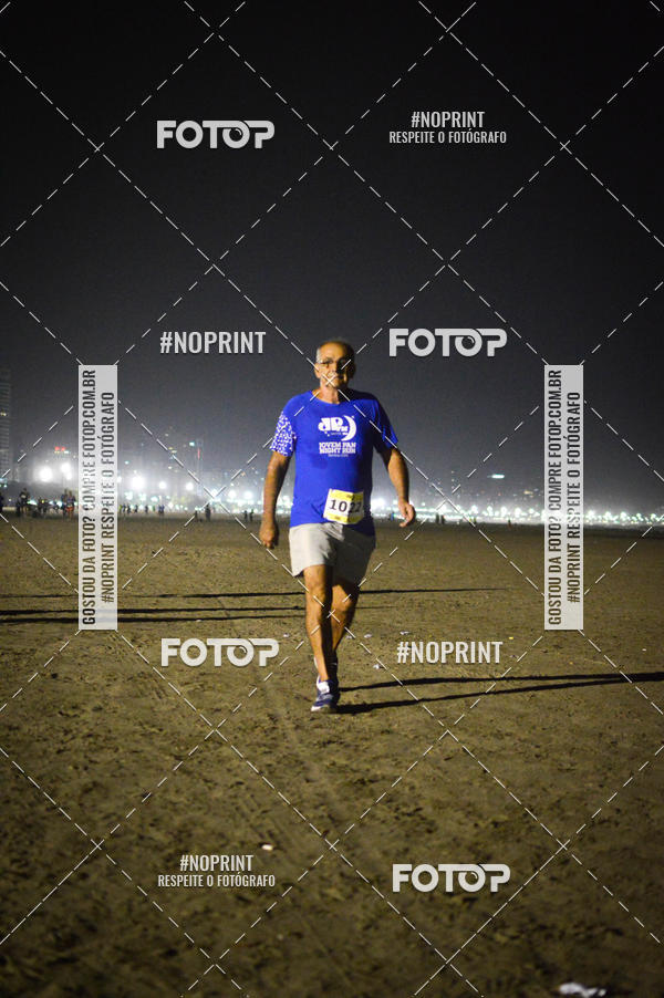 Buy your photos of the eventJovem Pan Night Run Santos on Fotop