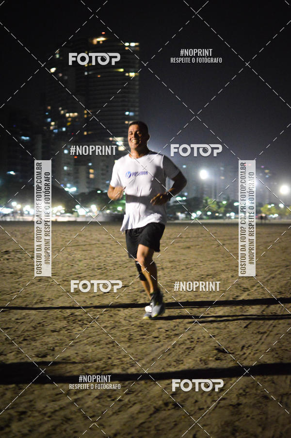 Buy your photos of the eventJovem Pan Night Run Santos on Fotop