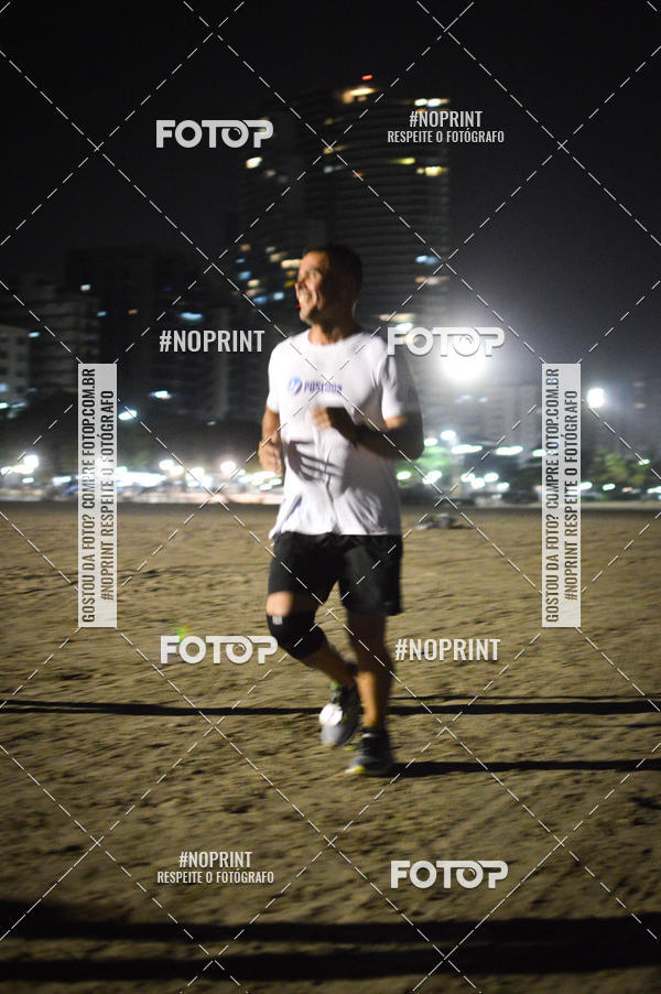 Buy your photos of the eventJovem Pan Night Run Santos on Fotop