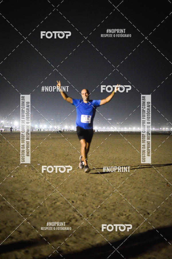 Buy your photos of the eventJovem Pan Night Run Santos on Fotop