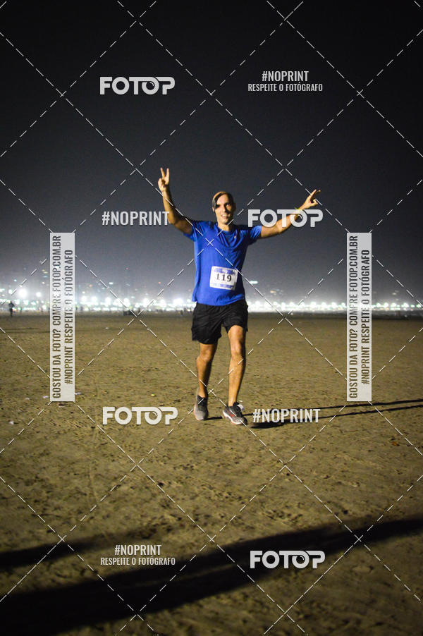 Buy your photos of the eventJovem Pan Night Run Santos on Fotop