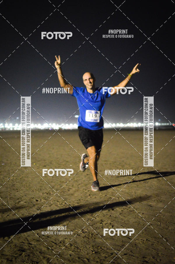 Buy your photos of the eventJovem Pan Night Run Santos on Fotop