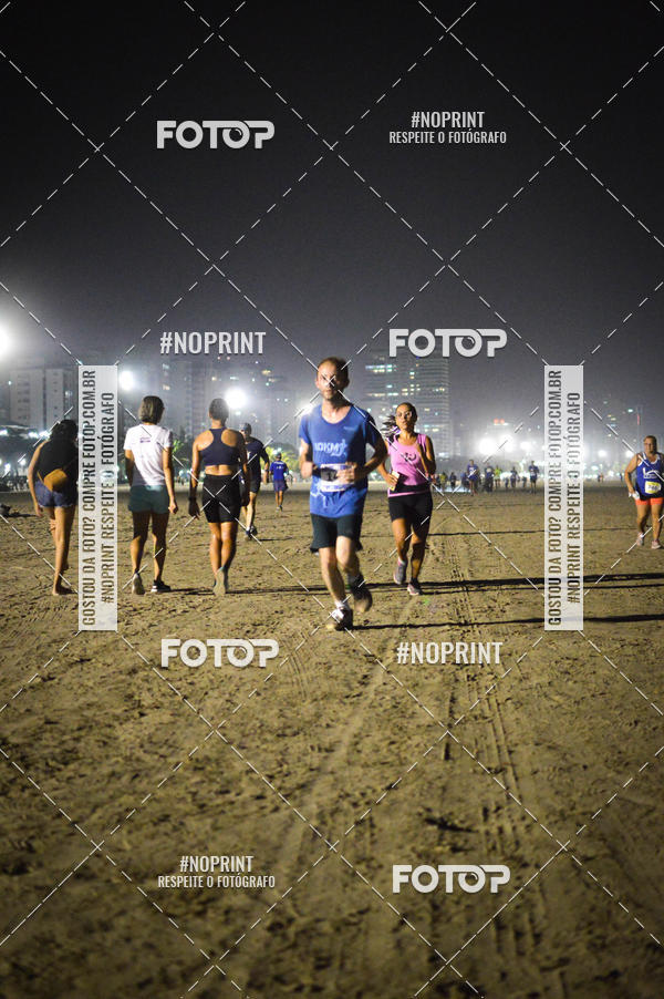Buy your photos of the eventJovem Pan Night Run Santos on Fotop