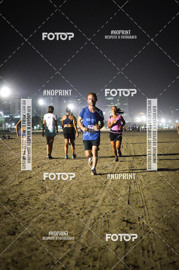 Buy your photos of the eventJovem Pan Night Run Santos on Fotop