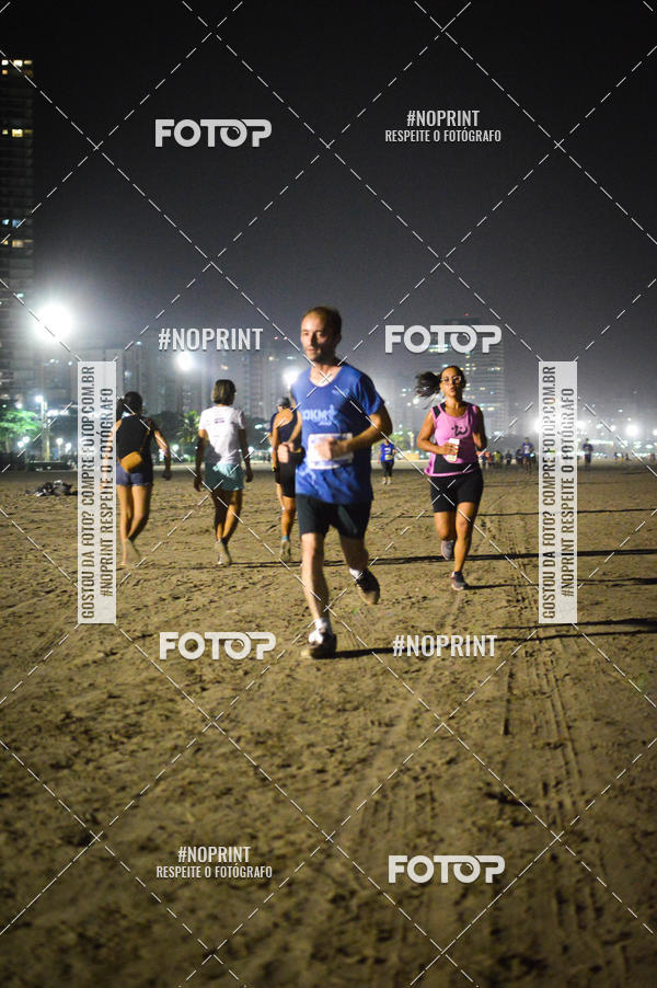 Buy your photos of the eventJovem Pan Night Run Santos on Fotop