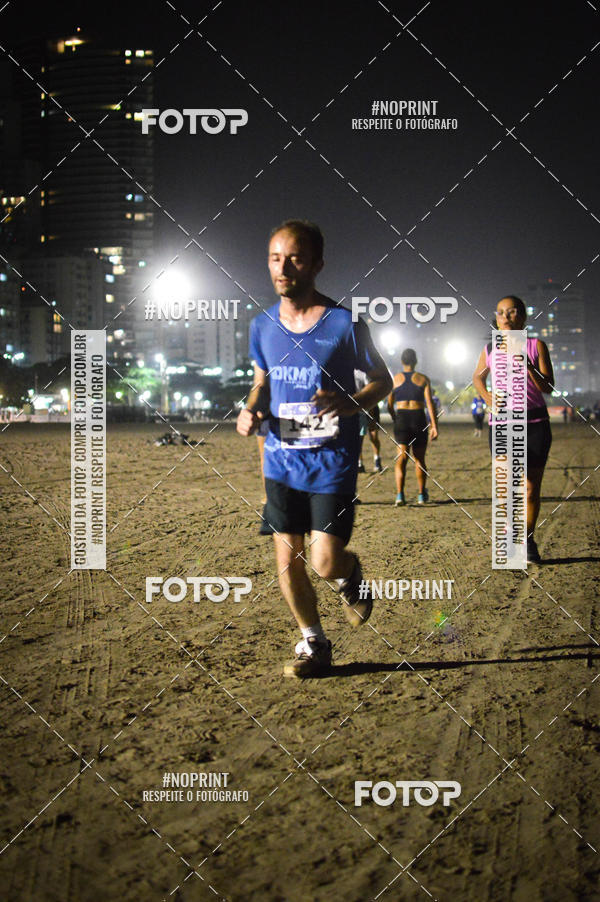 Buy your photos of the eventJovem Pan Night Run Santos on Fotop