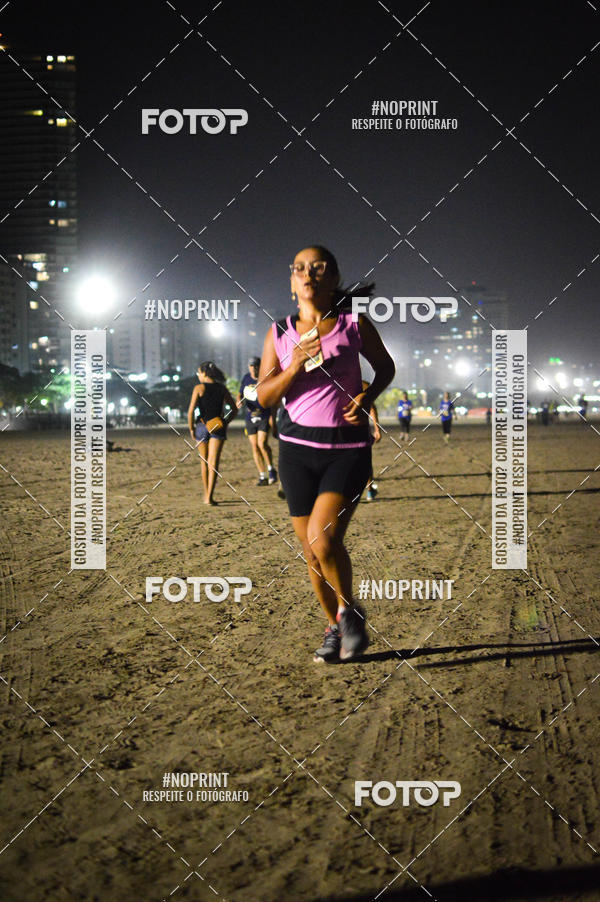 Buy your photos of the eventJovem Pan Night Run Santos on Fotop