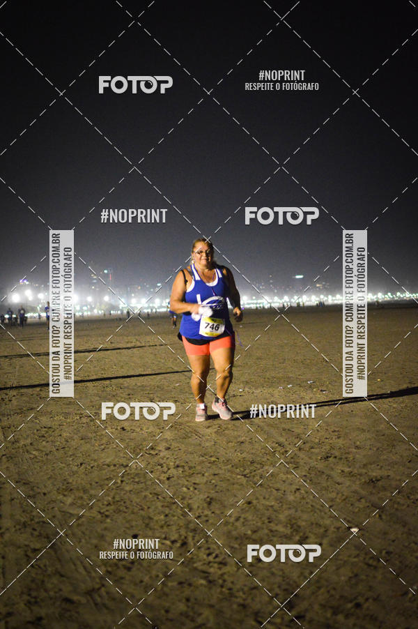 Buy your photos of the eventJovem Pan Night Run Santos on Fotop