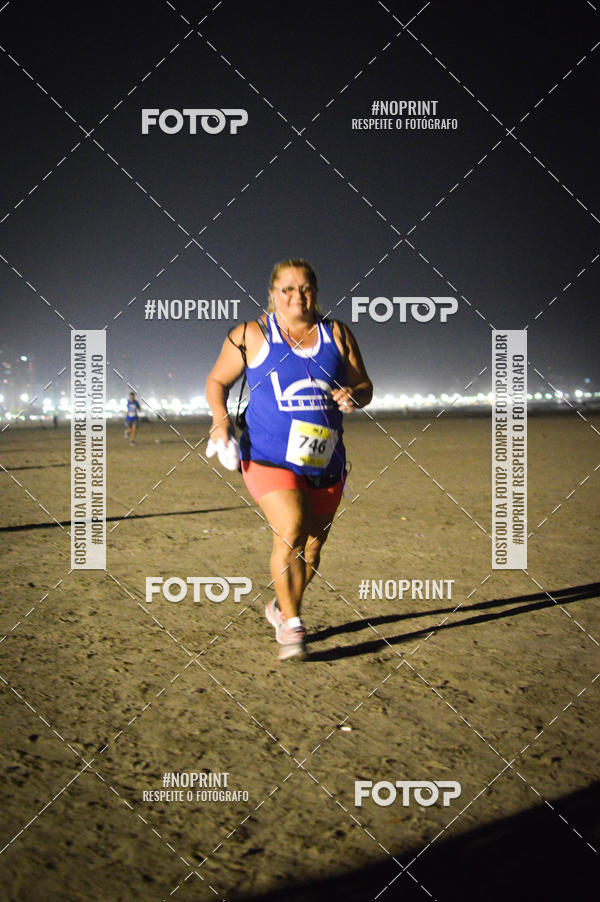 Buy your photos of the eventJovem Pan Night Run Santos on Fotop