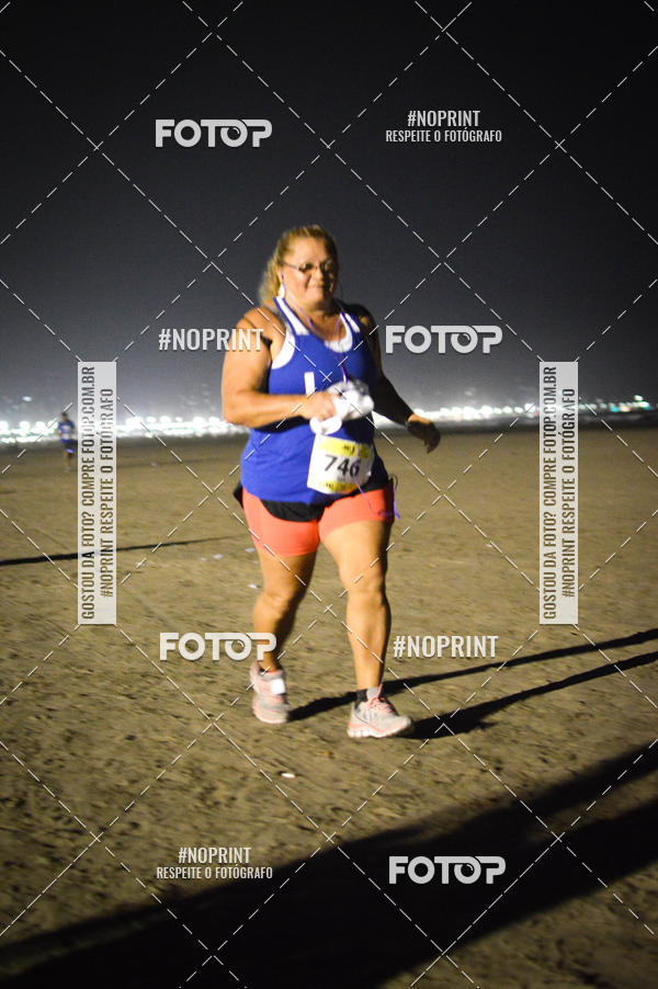 Buy your photos of the eventJovem Pan Night Run Santos on Fotop