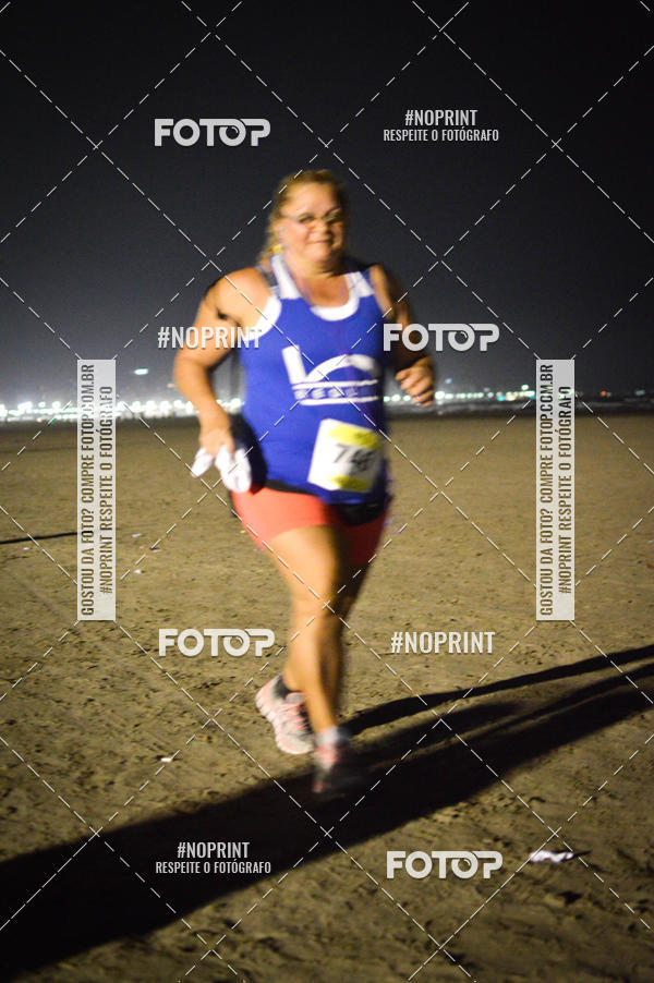 Buy your photos of the eventJovem Pan Night Run Santos on Fotop