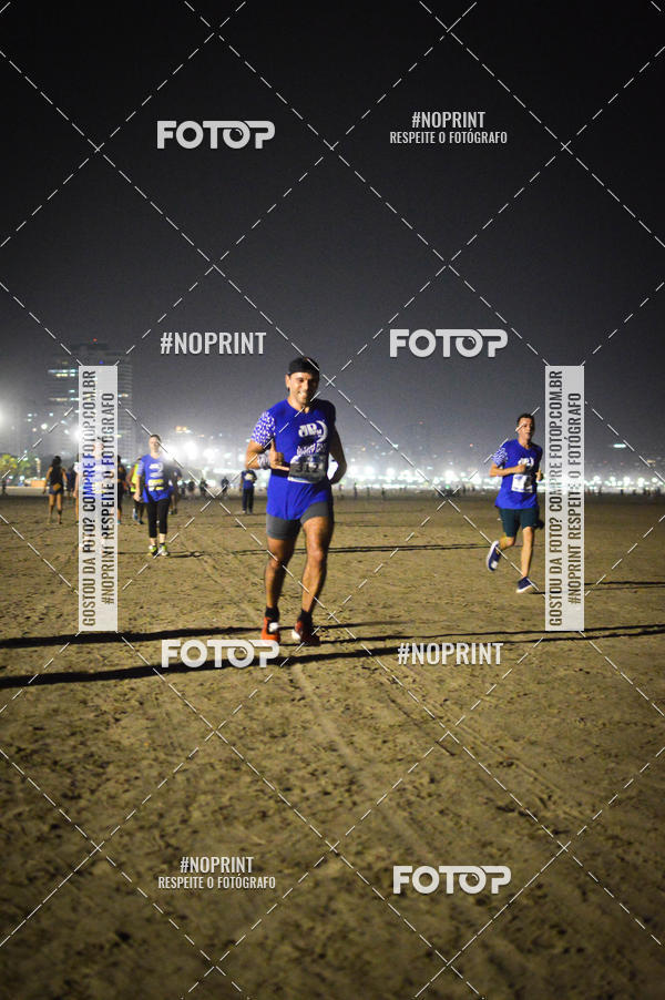 Buy your photos of the eventJovem Pan Night Run Santos on Fotop