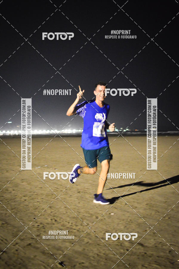 Buy your photos of the eventJovem Pan Night Run Santos on Fotop