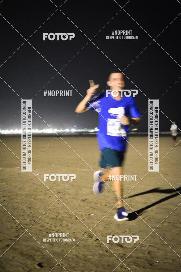 Buy your photos of the eventJovem Pan Night Run Santos on Fotop