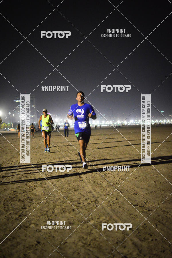 Buy your photos of the eventJovem Pan Night Run Santos on Fotop