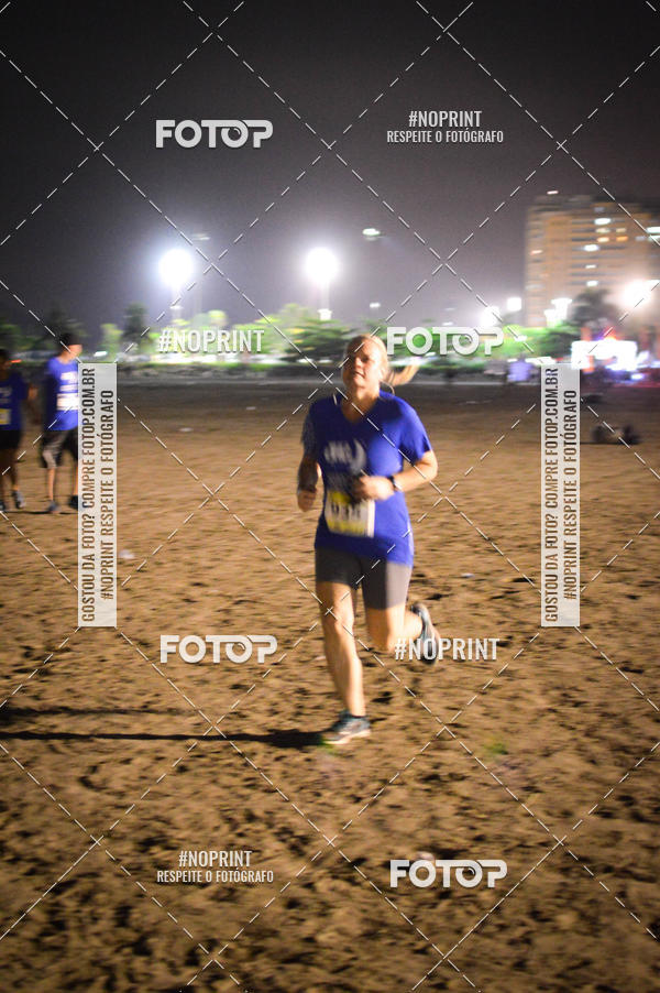 Buy your photos of the eventJovem Pan Night Run Santos on Fotop