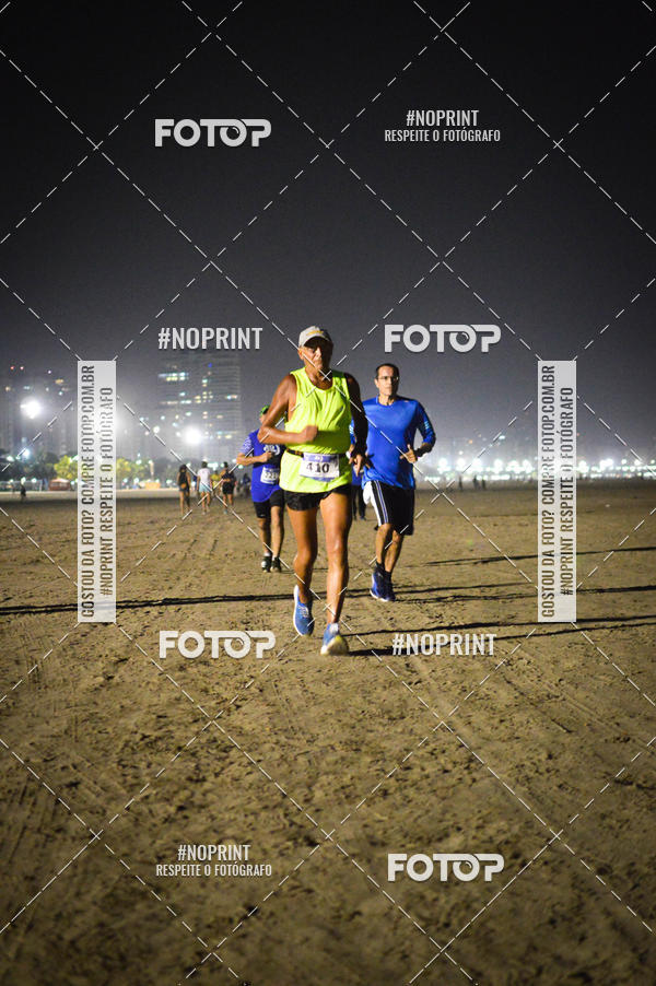 Buy your photos of the eventJovem Pan Night Run Santos on Fotop