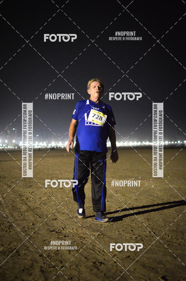 Buy your photos of the eventJovem Pan Night Run Santos on Fotop