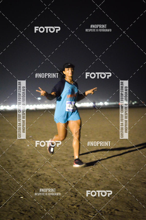 Buy your photos of the eventJovem Pan Night Run Santos on Fotop