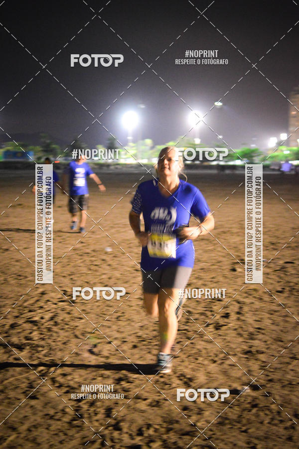 Buy your photos of the eventJovem Pan Night Run Santos on Fotop
