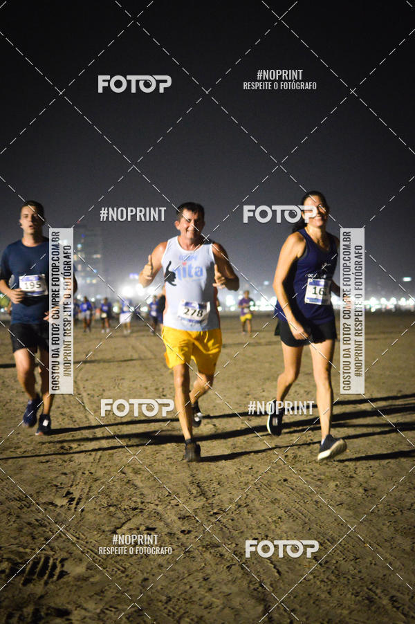 Buy your photos of the eventJovem Pan Night Run Santos on Fotop